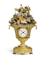 AN ORMOLU URN CLOCK WITH LATER MUSICAL AND AUTOMATON SINGING BIRD MECHANISMS, SWISS, CIRCA 1820 AND LATER