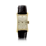 REFERENCE 2468 A YELLOW GOLD RECTANGULAR WRISTWATCH WITH FACETED CRYSTAL, MADE IN 1952