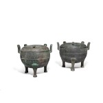 Two archaic bronze ritual tripod food vessels and covers, Ding, Warring States period | 戰國 青銅三足蓋鼎一組兩件
