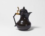 A Plaue-an-der-Havel Stoneware Brown/Black-Glazed Coffee-pot and Cover,  Circa 1717-30
