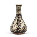 A rare Jizhou reverse-painted 'lion' vase, Southern Song dynasty 南宋 吉州窰深褐地白花獅子戲球蓮紋長頸瓶