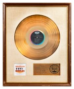 The Beatles | Gold record presented for "Help!"