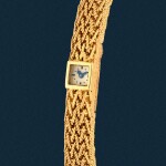 A yellow gold bracelet watch | Circa 1961
