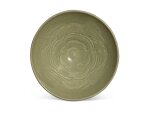 A large carved 'Yaozhou' celadon-glazed 'floral' bowl, Northern Song dynasty | 北宋 耀州窰青釉刻花大盌