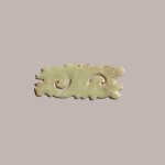 A jade 'cloud scroll' pendant, Neolithic period, Hongshan culture | 新石器時期 紅山文化 玉勾云佩