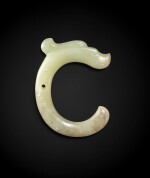 An important celadon jade ‘C-shaped' 'dragon' pendant Neolithic period, Hongshan culture | 新石器時代 紅山文化青白玉龍形珮