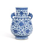 A blue and white handled vase, hu, Mark and period of Yongzheng | 清雍正 青花纏枝花卉紋鳩耳壺 《大清雍正年製》款