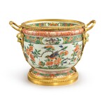 A Chinese Famille-Verte Wine Cooler with Regence Gilt Bronze Mounts, The Porcelain Kangxi, the mounts possibly later
