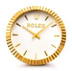 ROLEX, MANUFACTURED BY INDUCTA | A GILT BRASS WALL CLOCK, CIRCA 2010  | 勞力士，由 INDUCTA 製作 | 鍍金銅製掛鐘，約2010年製