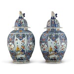 A PAIR OF DUTCH DELFT POLYCHROME OCTAGONAL VASES AND COVERS, 19TH CENTURY
