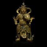 A large gilt-bronze figure of Weituo, Ming dynasty | 明 銅鎏金韋陀立像
