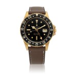 ROLEX | GMT-MASTER, REF 1675,  YELLOW GOLD DUAL TIME WRISTWATCH WITH DATE CIRCA 1977
