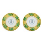 A FINE PAIR OF YELLOW-GROUND AND GREEN-ENAMELLED 'LOTUS' DISHES MARKS AND PERIOD OF YONGZHENG | 清雍正 黃地綠彩刻折枝番蓮紋盤一對 《大清雍正年製》款