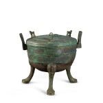 A large archaic bronze ritual food vessel and cover, Warring States period | 戰國 青銅龍紋獸足蓋鼎