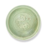 A large Longquan celadon-glazed 'dragon' dish, Yuan dynasty |  元 龍泉青釉刻花貼龍紋折沿大盤