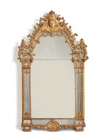 A RÉGENCE CARVED AND GILTWOOD MIRROR, CIRCA 1720