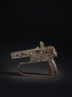 A magnificent and exceptionally rare silver-inlaid bronze crossbow casing and trigger, Late Warring States period - Han dynasty | 戰國末至漢 銅錯銀螭龍紋弩郭連弩機