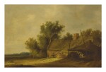 ATTRIBUTED TO PIETER DE NEYN | A WOODED LANDSCAPE WITH A COTTAGE AND FIGURES IN THE FOREGROUND, A PATH THAT EXTENDS BEYOND