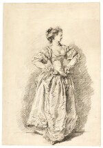 A pause during a dance: a Young woman with her hands on her hips