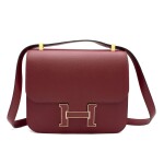  HERMÈS | ROUGE GRENADE CONSTANCE 24 IN EPSOM LEATHER WITH GOLD HARDWARE, 2016