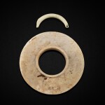 A jade 'dragon' pendant and a stone collared disc, Neolithic period 新石器時期 玉雕龍形珮飾及有領石璧一組兩件