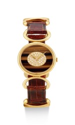 PIAGET | REFERENCE 9802 B, A YELLOW GOLD AND DIAMOND-SET WRISTWATCH WITH TIGER EYE DIAL, CIRCA 1972
