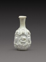 A Roman Opaque White Mould-Blown Glass Flask, circa 1st century A.D.