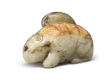 A gray and russet jade carving of a squirrel, Ming dynasty