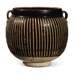 A black-glazed 'ribbed' handled jar, Northern Song / Jin dynasty | 北宋 / 金 黑釉棱線紋雙繫罐