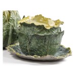  A CONTINENTAL FAIENCE CABBAGE TUREEN, COVER AND A STAND, LATE 18TH CENTURY