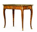 A Louis XV gilt-bronze mounted bois satiné, rosewood and mahogany marquetry table à écrire, mid-18th century