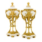 A pair of Louis XVI style gilt-bronze and white marble athéniennes, late 19th century, in the manner of Pierre Gouthière