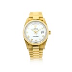 REFERENCE 18038 DAY-DATE A YELLOW GOLD AUTOMATIC WRISTWATCH WITH DAY, DATE, AND BRACELET, CIRCA 1986