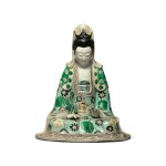 A famille-verte glazed biscuit figure of Guanyin, Qing dynasty, Kangxi period